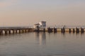 Marine pier for boats and yachts against the backdrop of the sunset. The Gulf of Finland. Royalty Free Stock Photo