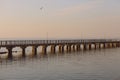 Marine pier for boats and yachts against the backdrop of the sunset. The Gulf of Finland. Royalty Free Stock Photo