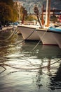 Marine port with moored yachts and boats in sea during sunset Royalty Free Stock Photo