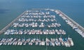 Marine port for yacht, motorboat, sailboat parking service and moorings for luxury and wealthy millionaire in aerial view with Royalty Free Stock Photo