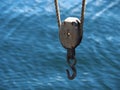 Marine sailing yachting background image of boat pulley with sea water behind Royalty Free Stock Photo