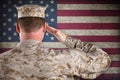 Marine Saluting an American Flag