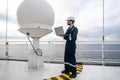 Service technician or serviceman near VSAT terminal Royalty Free Stock Photo