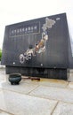 Marine Shadow looking on Japanese War Memorial