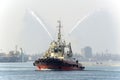 A marine tug performing work in the port of Odessa i Royalty Free Stock Photo