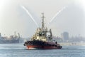 A marine tug performing work in the port of Odessa i Royalty Free Stock Photo