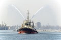 A marine tug performing work in the port of Odessa i Royalty Free Stock Photo