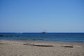 Sailboat and pedal catamaran in the Mediterranean off the coast of Rhodes. Kolympia, Greece