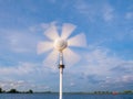 Marine wind turbine on sailboat Royalty Free Stock Photo