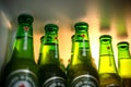 Marinette,WI / U.S.A. - Aug16,2019: Cold bottles of Heineken Beer with drops over green background. Heineken is the flagship produ Royalty Free Stock Photo