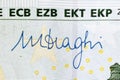 Mario Draghi`s signature on 100 Euro banknote. Mario Draghi is president of the European Central Bank