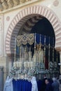 Semana Santa Maria float leaving the Mezquita in Cordoba, Spain. Royalty Free Stock Photo