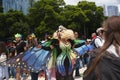 With a Mariposa costume spreads large wings painting the streets of Mexico City with rainbow color in the LGBTTI pride march