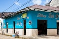 Colorful billiard hall on a corner of the historical town of Mariquita in Colombia Royalty Free Stock Photo