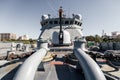 Maritime action warship. Naval artillery mounted on the deck. View from bow