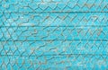 Maritime fishing net over turquoise blue wooden deck background Royalty Free Stock Photo