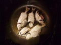 Maritimes kitchen. Frying fish in the galley. A healthy diet and a compelling lifestyle for active people at sea. Omega acids fro Royalty Free Stock Photo