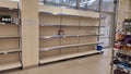 MARIUPOL, UKRAINE - Feb. 26, 2022: ATB Shop almost empty shelfs with main products of food supply. War against Ukraine.