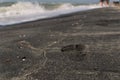 Mark on black sand