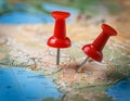 Marker pointing to a specific location on a map, representing geographic positioning and site identification