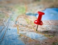 Marker pointing to a specific location on a map, representing geographic positioning and site identification