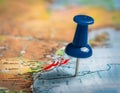 Marker pointing to a specific location on a map, representing geographic positioning and site identification