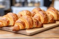 Market bakery display of delicious sweet croissants Royalty Free Stock Photo