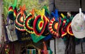 A market in the Carribean with Rasta hats