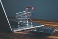 Market E-commerce, Online Shopping Payment Concept, Business Marketing Ecommerce Via Online Network. Mini Shopping Cart on Compute Royalty Free Stock Photo