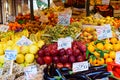 A market with fresh vegetables and fruit in boxes in Venice near the Rialto Bridge.