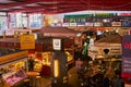 Market hall with stalls for the sale of food and small snack shops for the consumption of tasty dishes