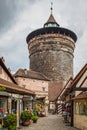 Market by medieval tower in the old town of Nuremberg Royalty Free Stock Photo