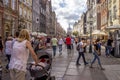 Market in the old part of Gdansk with many happy people on the street, nice summer dayK