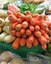 Market place in Torrevieja, Spain, with carrots, parsnips, parsley, potatoes for sale Royalty Free Stock Photo