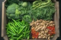 market produce basket holds organic green vegetables for sale Royalty Free Stock Photo