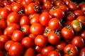 Market scene Pile of fresh red tomatoes, close up background