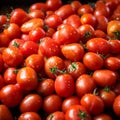 Market scene Pile of fresh red tomatoes, close up background