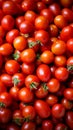 Market scene Pile of fresh red tomatoes, close up background