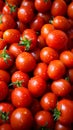 Market scene Pile of fresh red tomatoes, close up background