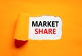 Market share symbol. Concept words Market share on beautiful white paper. Beautiful orange table orange background. Business and Royalty Free Stock Photo