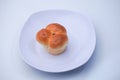 Market snack bread filled with jam on a white background