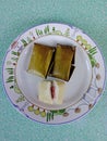 A market snack, filled with rice flour filled with bananas, covered with banana leaves. Natural, healthy food.