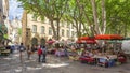 Market on a square in Aix en Provence Royalty Free Stock Photo