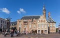 Market square with people and town hall in Haarlem