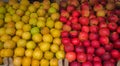 A pile of yellow and red apples on a market stall Royalty Free Stock Photo