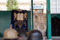 Market stall catering to tourists, selling Judaica and vintage items of Jewish interest, in Plac Nowy, Kazimierz, Krakow Poland