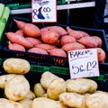 Market Stall Selling Sweet And Baking Potatoes Royalty Free Stock Photo