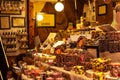 Market stall showing an assortment of handmade candles from spices at traditional famous christmas market at Merano