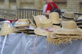 market stall with straw hats. Big group of authentic panama hats or paja toquilla hats made from straw at craft market img Royalty Free Stock Photo