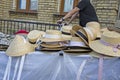 market stall with straw hats. Big group of authentic panama hats or paja toquilla hats made from straw at craft market img Royalty Free Stock Photo